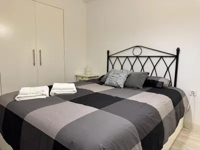 Cama o camas de una habitación en El refugio de San Miguel & parking gratuito