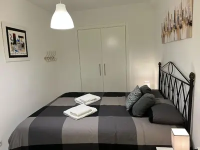Cama o camas de una habitación en El refugio de San Miguel & parking gratuito
