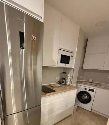 Una cocina o zona de cocina en Apartamento Jardines del Brillante