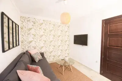 Una televisión o centro de entretenimiento en Lineros suite B