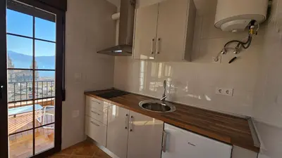 Una cocina o zona de cocina en Mirador de Jaén I - Departamentos