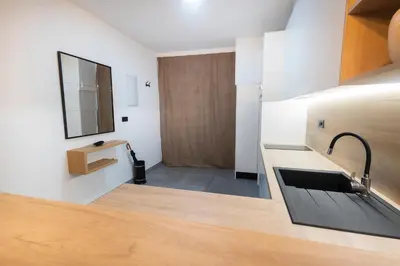 Una cocina o zona de cocina en RentalSevilla Enjoy Nervión