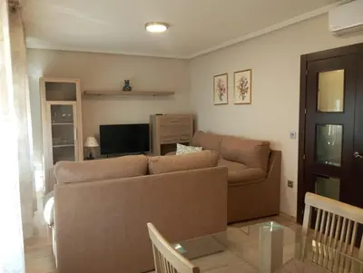 Zona de estar de PLAZA AYUNTAMIENTO 3 HaBITACIONES B&A
