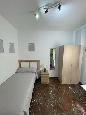 Cama o camas de una habitación en Carniceros - Apartamento céntrico y tranquilo