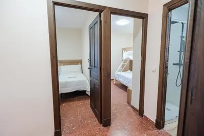 Cama o camas de una habitación en Casa Rural VILLA ADRISEDA