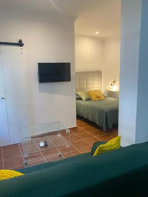 Cama o camas de una habitación en Junto al Rincón del Dulce