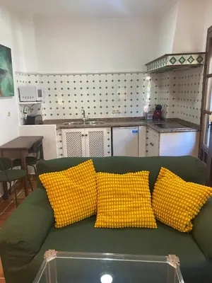 Una cocina o zona de cocina en Junto al Rincón del Dulce