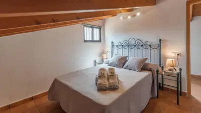 Cama o camas de una habitación en Casa Mis Niñas Casabermeja by Ruralidays
