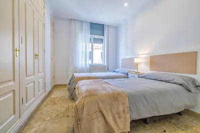 Cama o camas de una habitación en Apto Cruz Conde Center