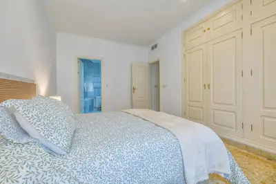 Cama o camas de una habitación en Apto Cruz Conde Center