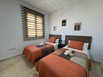 Cama o camas de una habitación en Apartamento Centro Puente Romano