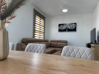 Una televisión o centro de entretenimiento en Apartamento Centro Puente Romano