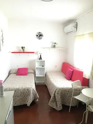 Cama o camas de una habitación en Alameda Ático A
