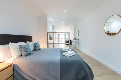 Cama o camas de una habitación en Sevilla Azahar