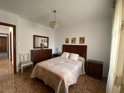 Cama o camas de una habitación en La Casa de Domingo
