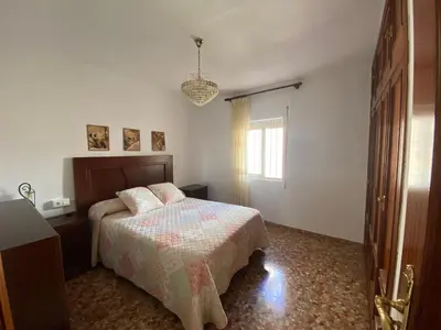 Cama o camas de una habitación en La Casa de Domingo