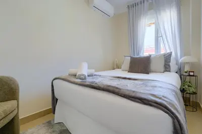 Cama o camas de una habitación en Sevilla Exclusive Apartment - Prime Location