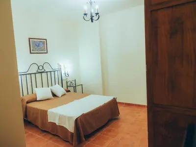 Cama o camas de una habitación en Apartamentos Molino Almona HC