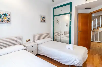 Cama o camas de una habitación en Geysotur Mirador de la Calahorra
