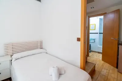 Cama o camas de una habitación en Geysotur Mirador de la Calahorra