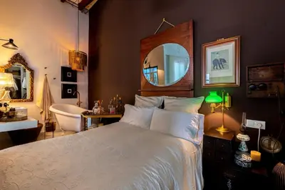 Cama o camas de una habitación en Loft singular en casa regionalista Sevilla centro