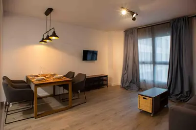 Una televisión o centro de entretenimiento en Precioso apartamento para rest work and enjoy en Cordoba Centro 5B