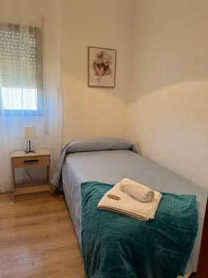Cama o camas de una habitación en Alojamiento Baeza-El Limonero B
