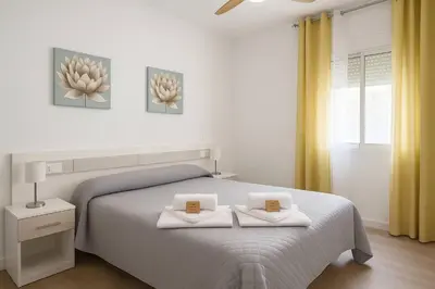 Cama o camas de una habitación en Alojamiento Baeza-El Limonero B