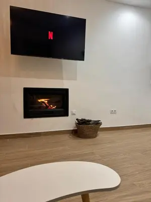 Una televisión o centro de entretenimiento en La Casita de San Benito