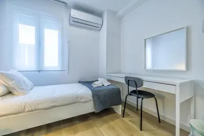 Cama o camas de una habitación en El Oasis de San Lorenzo