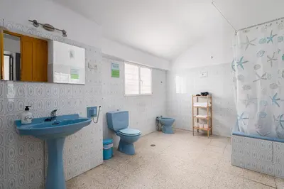 Un baño de Casa Curro - Mansión con Piscina