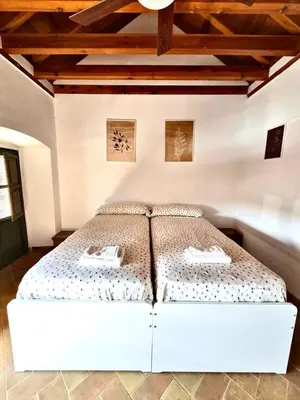 Cama o camas de una habitación en Casa en La Corredera