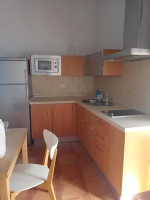 Una cocina o zona de cocina en Apartamento La Carmela