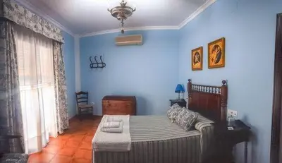 Cama o camas de una habitación en CasaBlancaflor