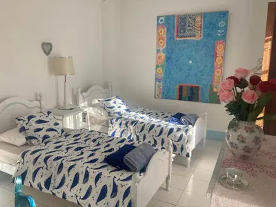 Cama o camas de una habitación en Bohemian Villa Malaga by PriorityVillas