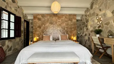 Cama o camas de una habitación en New! Your ultimate luxury finca with 11BR, Pool, Jacuzzi, Gym and Sauna just 30 minutes from Malaga!