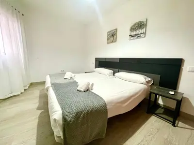 Cama o camas de una habitación en Geysotur Tierra Cordobesa