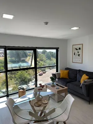 Zona de estar de Apartamento parking y piscina incluido