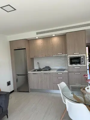 Una cocina o zona de cocina en Apartamento parking y piscina incluido