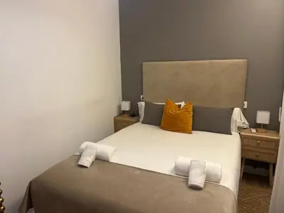Cama o camas de una habitación en Mucho Trigo Apartments A