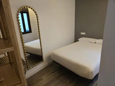 Cama o camas de una habitación en Mucho Trigo Apartments B