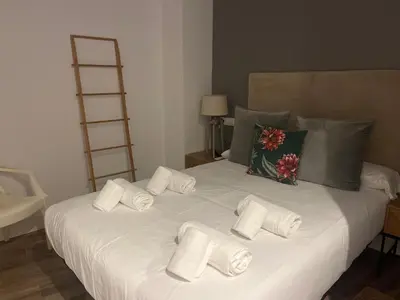 Cama o camas de una habitación en Mucho Trigo Apartments C