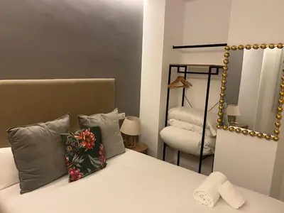Cama o camas de una habitación en Mucho Trigo Apartments C