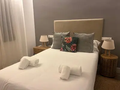 Cama o camas de una habitación en Mucho Trigo Apartments C