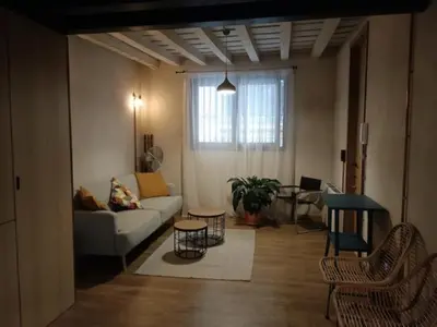 Zona de estar de Encantador apartamento con patio en Macarena