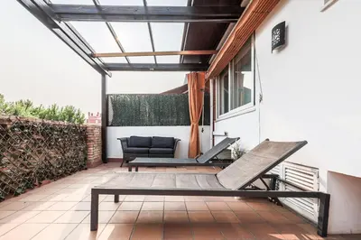Zona de estar de Bonito ático en el centro con terraza