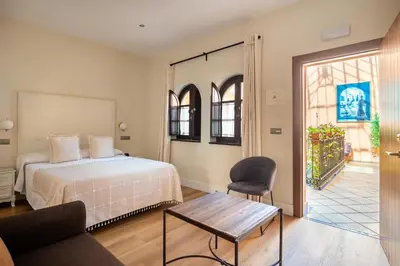 Cama o camas de una habitación en Patio de La Alameda