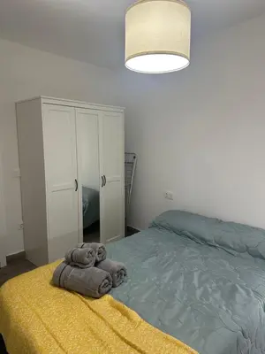Cama o camas de una habitación en Encantador Bajo en Villafranca de Córdoba