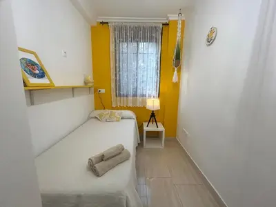 Cama o camas de una habitación en Casa Cora Barrio San Basilio Centro Córdoba
