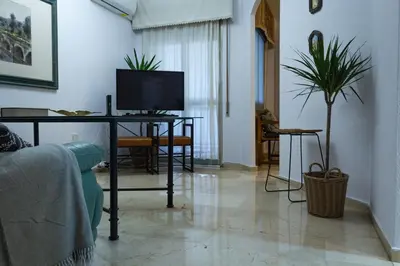 Una televisión o centro de entretenimiento en CMApartamentos